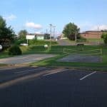 Park with basketball court and volleyball net